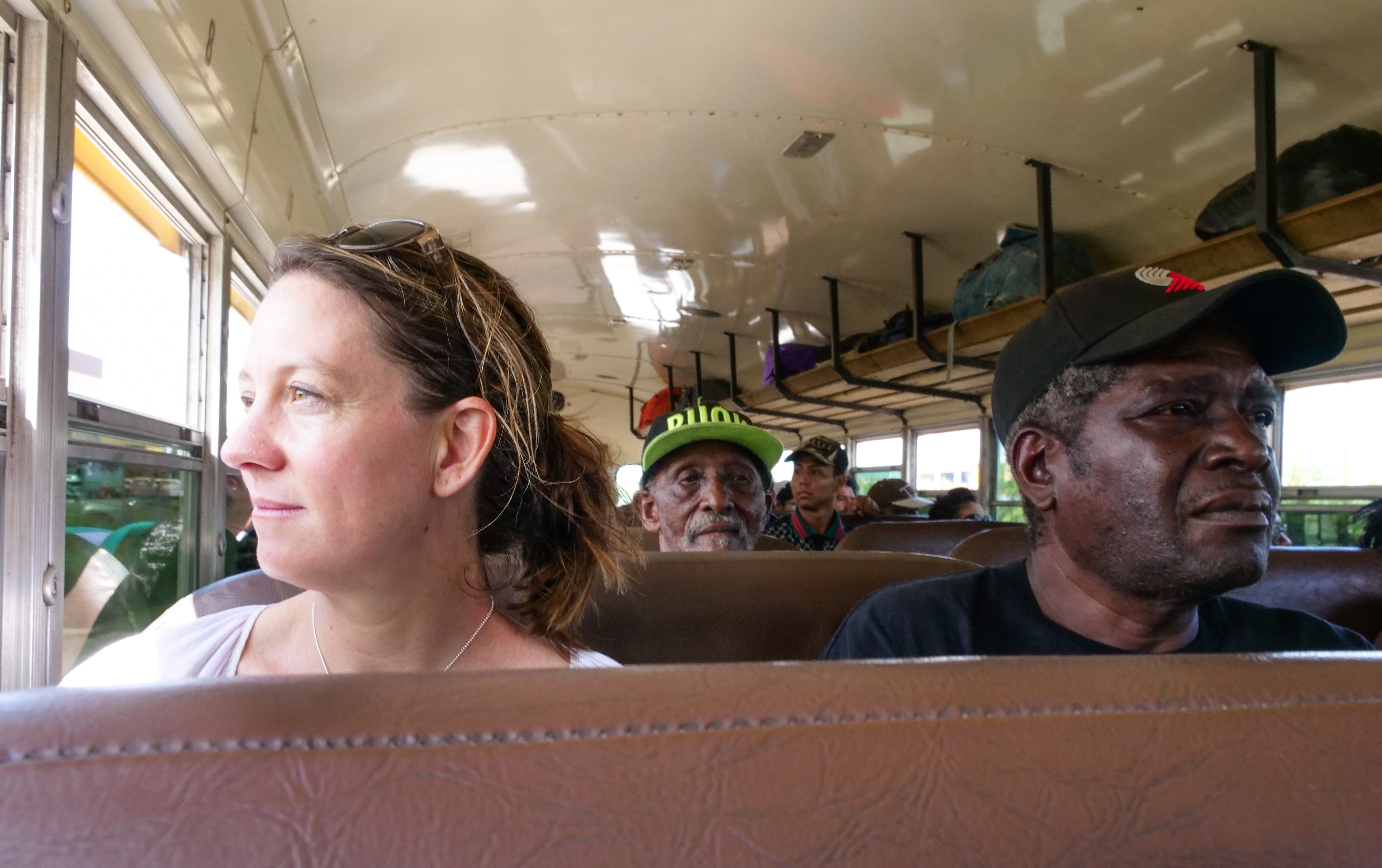 Salt staff member Amy West sits inside a bus.