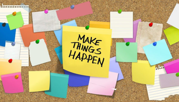 a bulletin board of sticky notes that says Make Things Happen